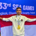 Atlet kickboxing Indonesia, Riyan Jefri Hamonangan Lumbanbatu (24), berhasil mempersembahkan medali emas SEA Games 2025 Thailand setelah melalui pertandingan yang penuh rintangan. (foto:dok/kemenpora.go.id)