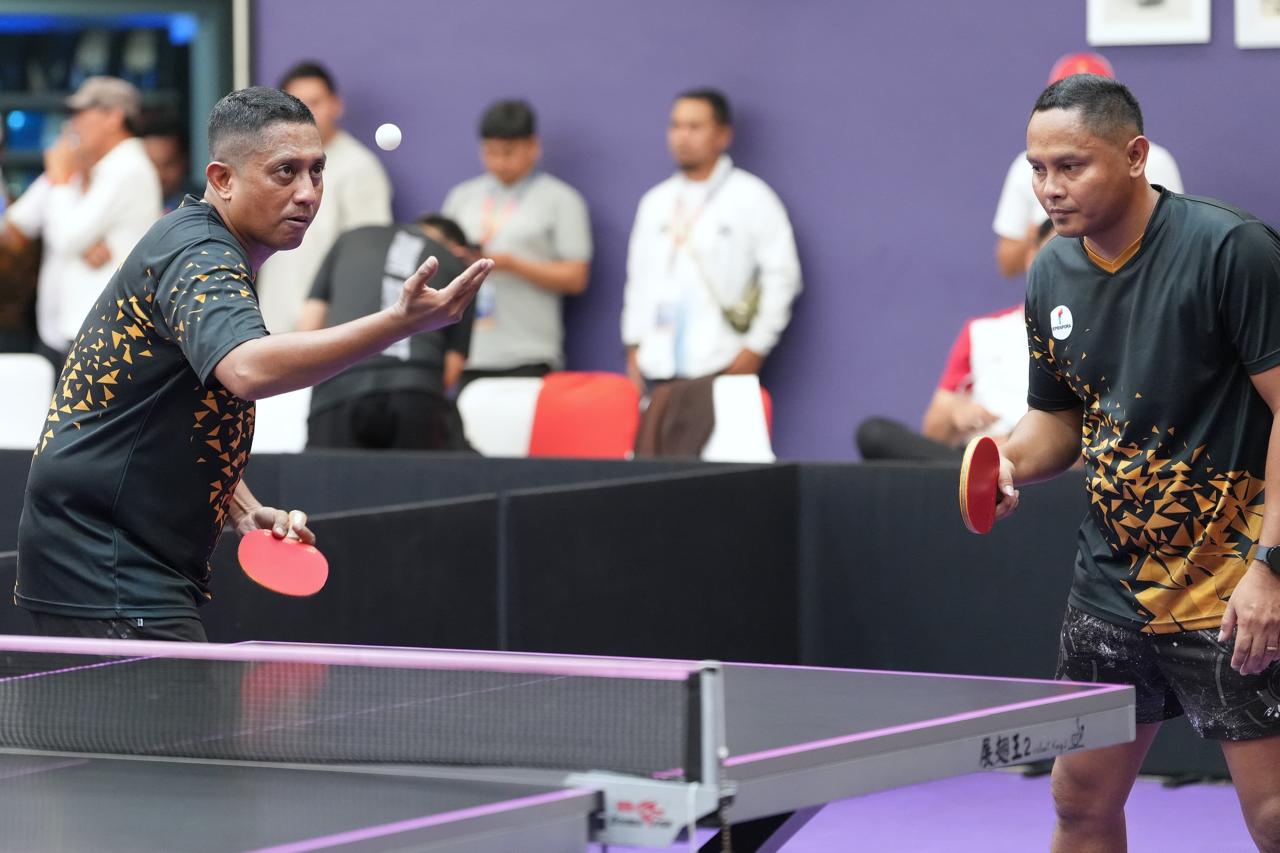 Tim tenis meja Kementerian Pemuda dan Olahraga (Kemenpora) kembali menunjukkan semangat juang yang tinggi dalam ajang Pekan Olahraga Nasional (Pornas) Korps Pegawai Republik Indonesia (Korpri) XVII Tahun 2025 di Palembang, Sumatera Selatan.(foto:Herry/kemenpora.go.id)