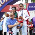 Melalui cabang olahraga atletik pada ajang Pekan Olahraga Nasional (Pornas) XVII Korps Pegawai Republik Indonesia (Korpri) Tahun 2025, atlet lari Kementerian Pemuda dan Olahraga (Kemenpora), Rumini, berhasil meraih medali emas pada nomor lari 5 kilometer (5K). (foto:raiky/kemenpora.go.id)